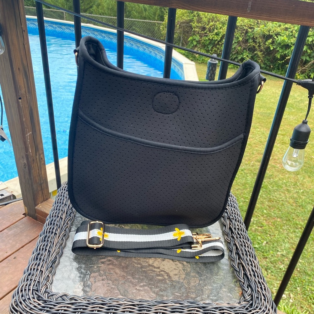 Ahdorned crossbody purse
